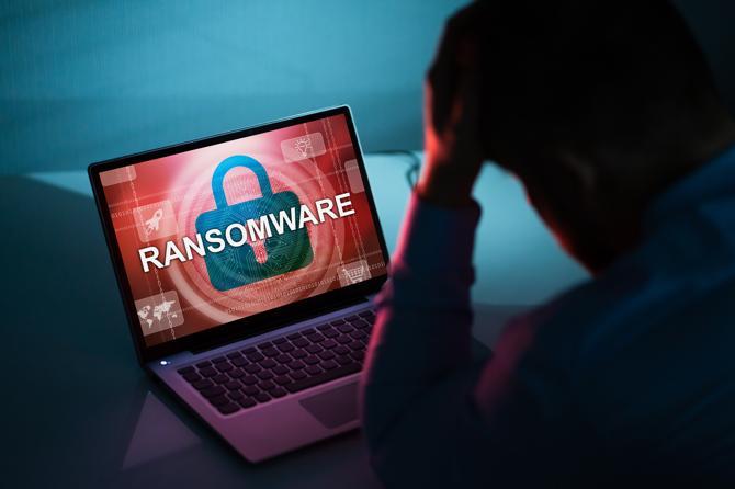 A laptop displays an attack enabled by ransomware as a service